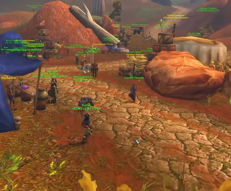 Le camp de commerce de l’Alliance à Trois chemins, en jeu : la tente de la marchande d’enchantement, l’officière de ravitaillement et les caisses
